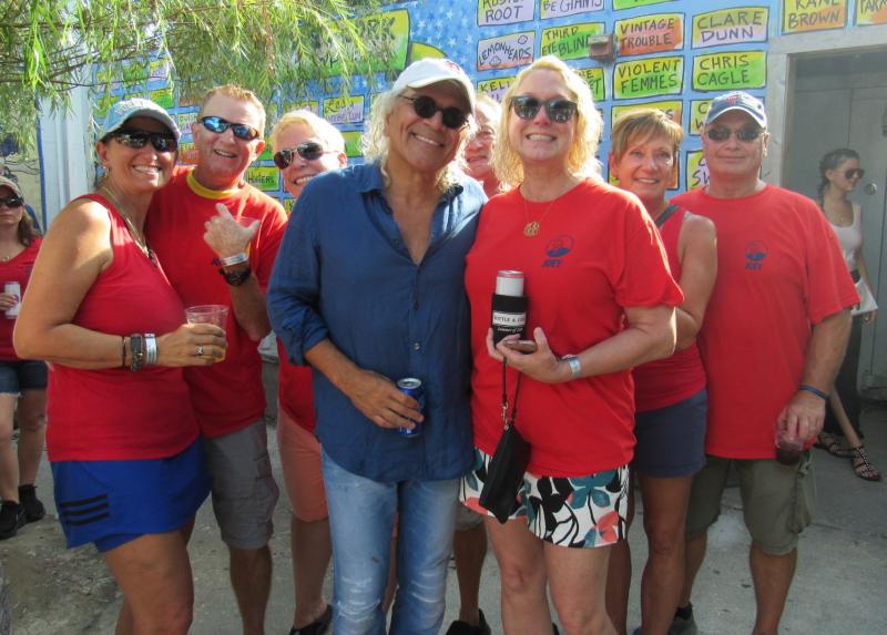 Friends toast Joey Adams at Bottle & Cork Cape Gazette